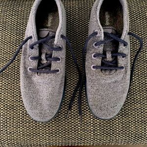 2 pair of Allbirds men’s wool runners. One blue, one black. Both size 12